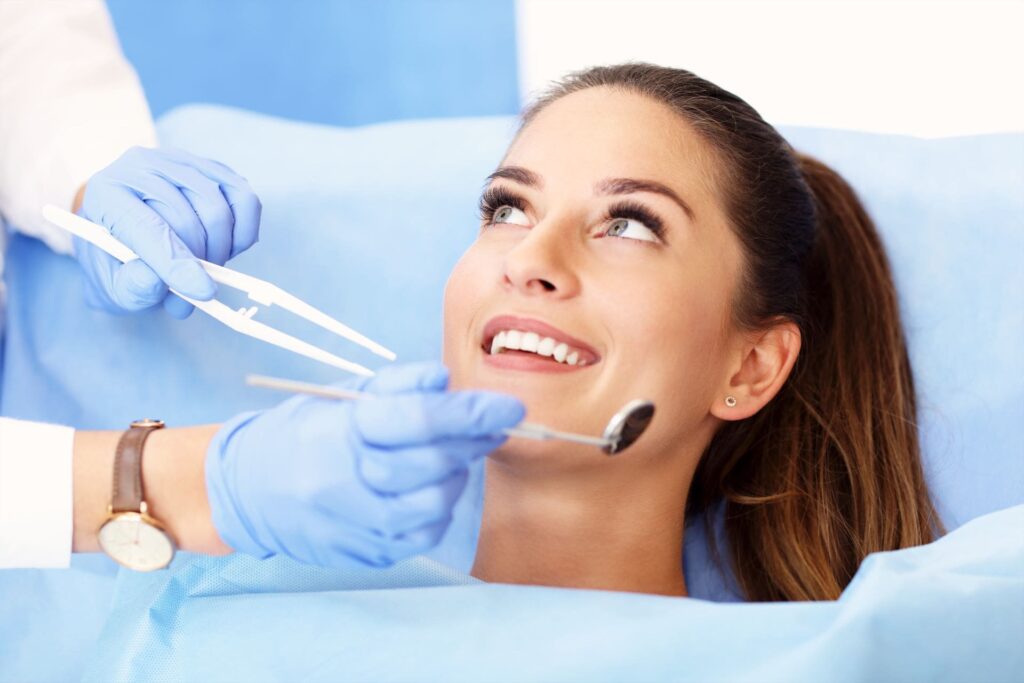 adult woman having a visit at the dentist