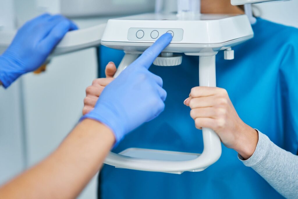 dentist taking a panoramic digital x-ray